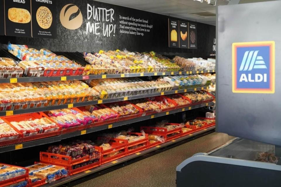 Inside Aldi supermarket bread aisle, loaves of bread on shelves