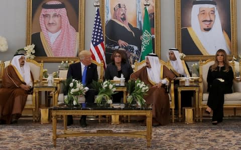 Saudi Arabia's King Salman bin Abdulaziz Al Saud meets with U.S. President Donald Trump and first lady Melania Trump during a reception ceremony in Riyadh, Saudi Arabia, May 20, 2017 - Credit: Reuters