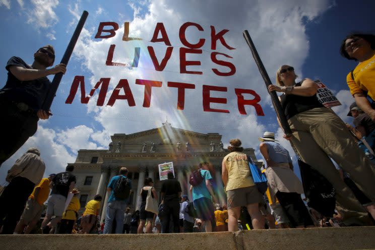 People take part in the Million People's March Against Police Brutality, Racial Injustice and Economic Inequality in Newark, New Jersey, July 25, 2015.