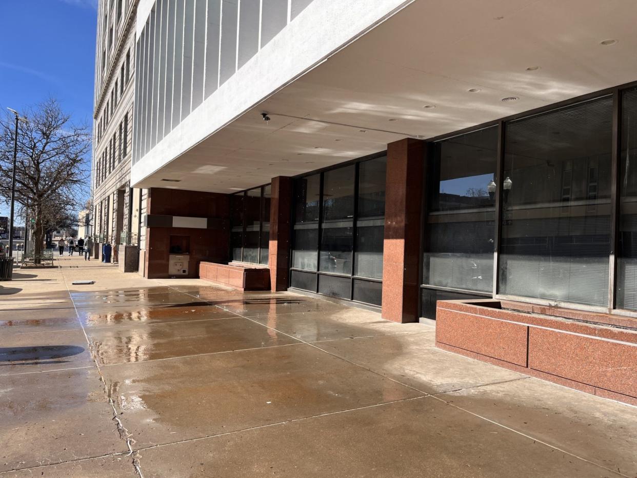 Water seen leaking from downtown Peoria's Chase Bank Building Friday. The building's fire suppression system was down because of the water leak.