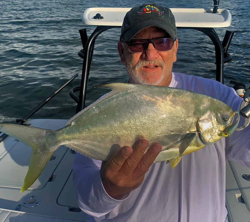 Joey Grassett, of Seaford, Delaware, caught this good size pompano on a D.O.A. CAL jig with a shad tail while fishing Sarasota Bay with his brother Capt. Rick Grassett of Sarasota recently. 