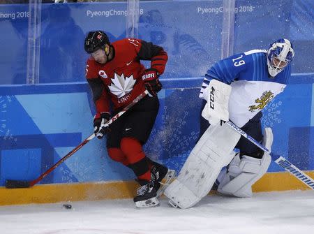 Ice Hockey - Pyeongchang 2018 Winter Olympics - Man’s Quarterfinal Match - Canada v Finland - Gangneung Hockey Centre, Gangneung, South Korea - February 21, 2018 - Brandon Kozun of Canada in action with goalie Mikko Koskinen of Finland. REUTERS/Brian Snyder