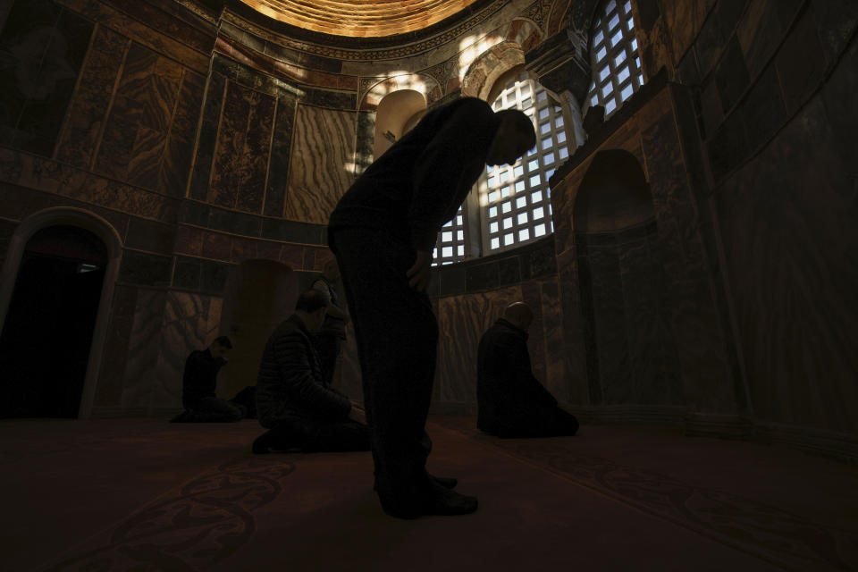 Muslim worshippers perform evening prayer in a former Byzantine church which formally opened as a mosque, in Istanbul, Turkey, Monday, May 6, 2024. Turkish President Recep Tayyip Erdogan formally opened a former Byzantine church in Istanbul as a mosque on Monday, four years after his government had designated it a Muslim house of prayer, despite criticism from neighboring Greece. (AP Photo/Emrah Gurel)