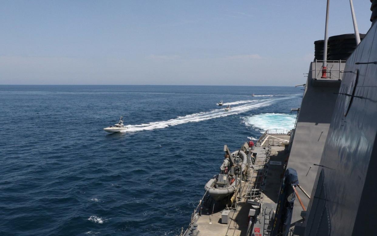 Iranian Islamic Revolutionary Guard Corps Navy (IRGCN) vessels conducted unsafe and unprofessional actions against US Military ships by crossing the ships' bows and sterns at close range. - EPA