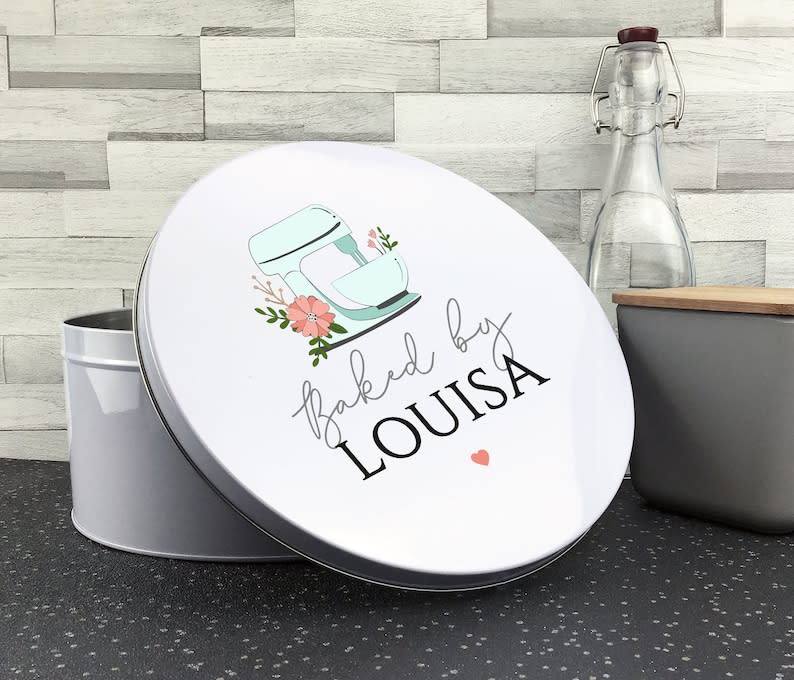 <p><a href="https://clicks.trx-hub.com/xid/hearstcorp_9eb67_tpw?q=https%3A%2F%2Fwww.etsy.com%2Flisting%2F790260536%2Fpersonalised-cake-tin-baking-gift-baked&p=https%3A%2F%2Fwww.thepioneerwoman.com%2Fholidays-celebrations%2Fgifts%2Fg32406292%2Fgifts-for-bakers%2F&utmSource=yahoo-us&utmCampaign=3208&utmMedium=syn" rel="nofollow noopener" target="_blank" data-ylk="slk:Shop Now;elm:context_link;itc:0;sec:content-canvas" class="link rapid-noclick-resp">Shop Now</a></p><p>Personalized Cake Tins</p><p>etsy.com</p><p>$18.66</p><span class="copyright">Etsy</span>