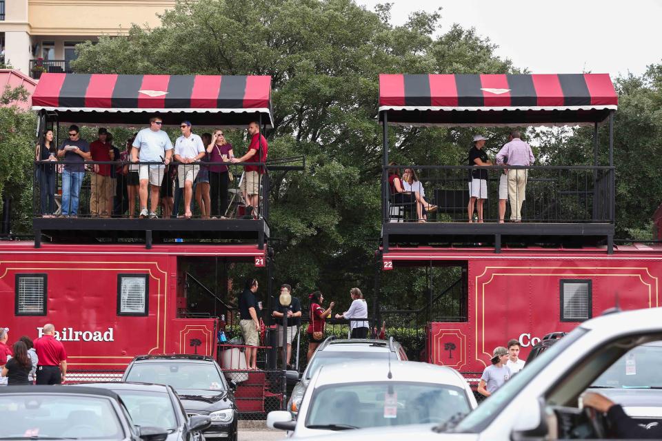 Sep 27, 2014; Columbia, SC, USA; South Carolina Gamecocks fans tailgate at the "Cockabooses" lined up behind Williams-Brice Stadium. Missouri wins in the final minutes 21-20 over South Carolina. Mandatory Credit: Jim Dedmon-USA TODAY Sports