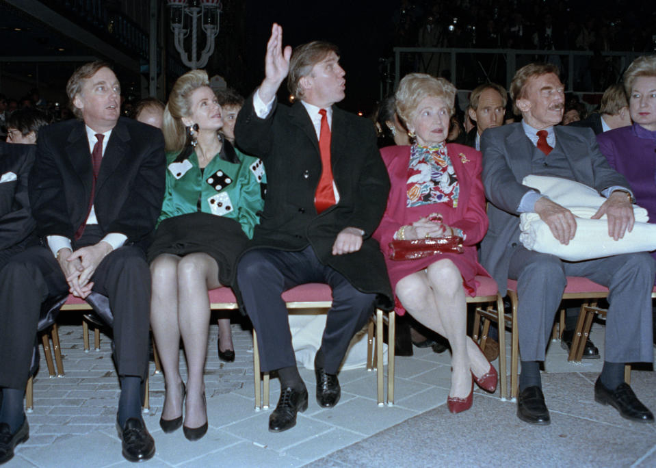 Pictured is Robert Trump and his then-wife, Blaine Trump, sitting at an event.