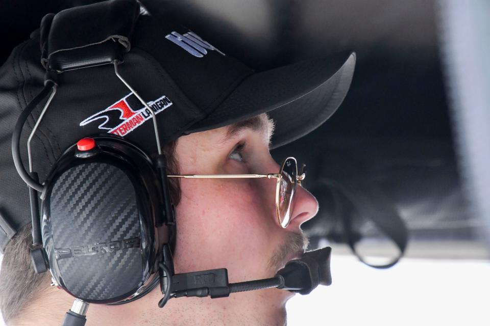 Rahal Letterman Lanigan Racing driver Christian Lundgaard (45) stands in his pit box Friday, May 19, 2023, during Fast Friday ahead of the 107th running of the Indianapolis 500 at Indianapolis Motor Speedway. 