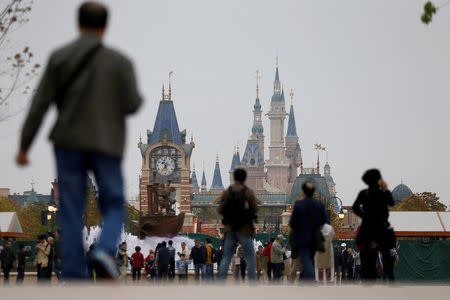 People visit Disney Town of Shanghai Disney Resort in Shanghai, China, April 26, 2016. REUTERS/Aly Song/File Photo