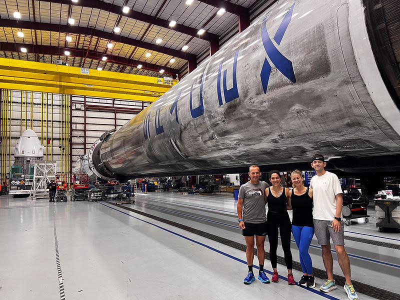 Poteet, Gillis, Menon and Isaacman check out their Falcon 9 rocket and Crew Dragon capsule during a visit to SpaceX's processing hangar at the Kennedy Space Center. / Credit: Polaris Dawn