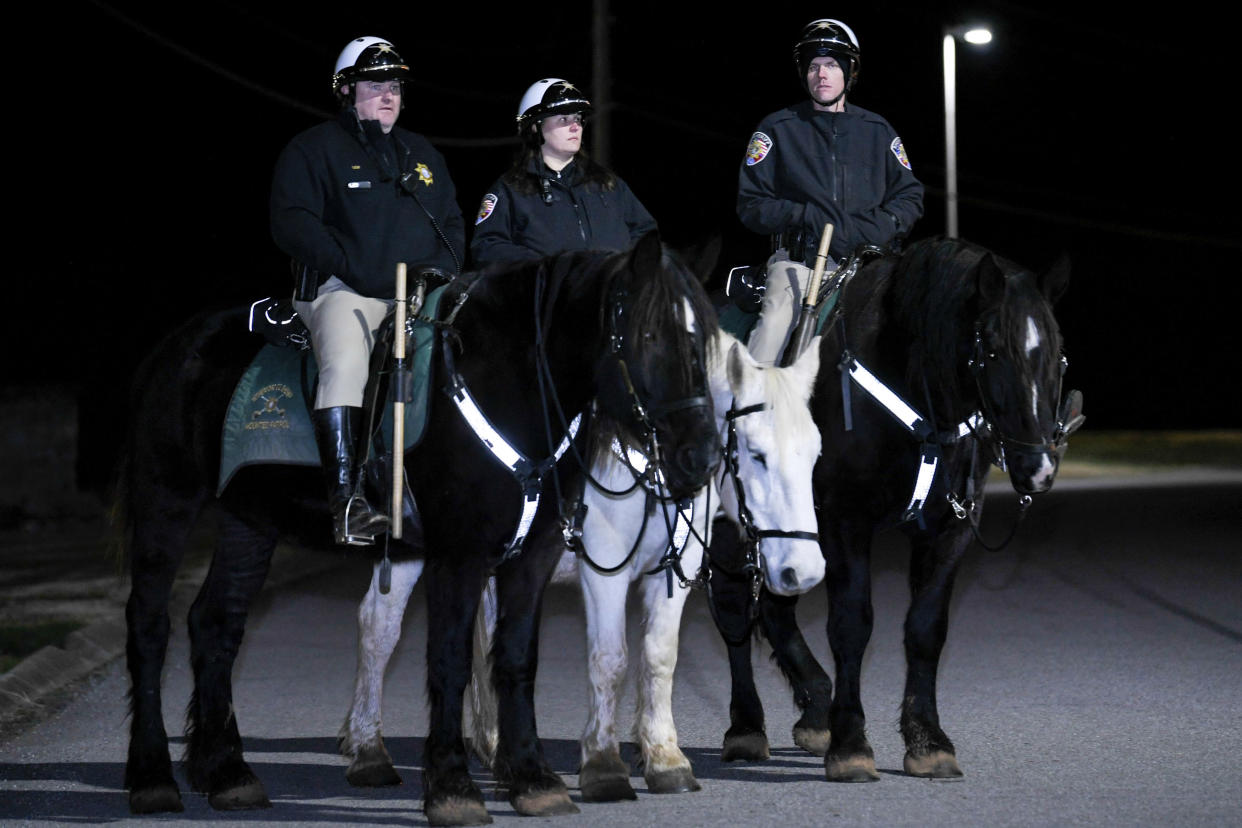 Mounted police outside the Tennessee prison (AP)