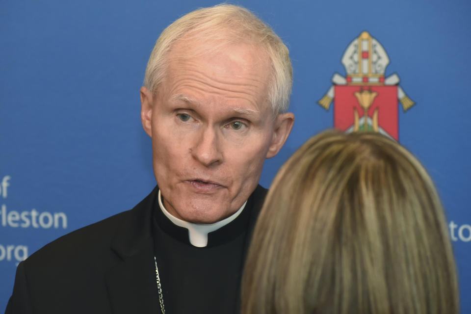 CORRECTS IDENTIFICATION TO MARK BRENNAN INSTEAD OF MICHAEL BRANSFIELD - Bishop Mark Brennan announces his appointment to serve as bishop of the Diocese of Wheeling-Charleston, during a news conference, Tuesday, July 23, 2019, in Wheeling, W.Va. Pope Francis named Brennan to lead West Virginia's Catholics following a scandal over the former bishop, Michael Bransfield, sexual harassment of adults and lavish spending of church money. (Scott McCloskey/The Intelligencer via AP)