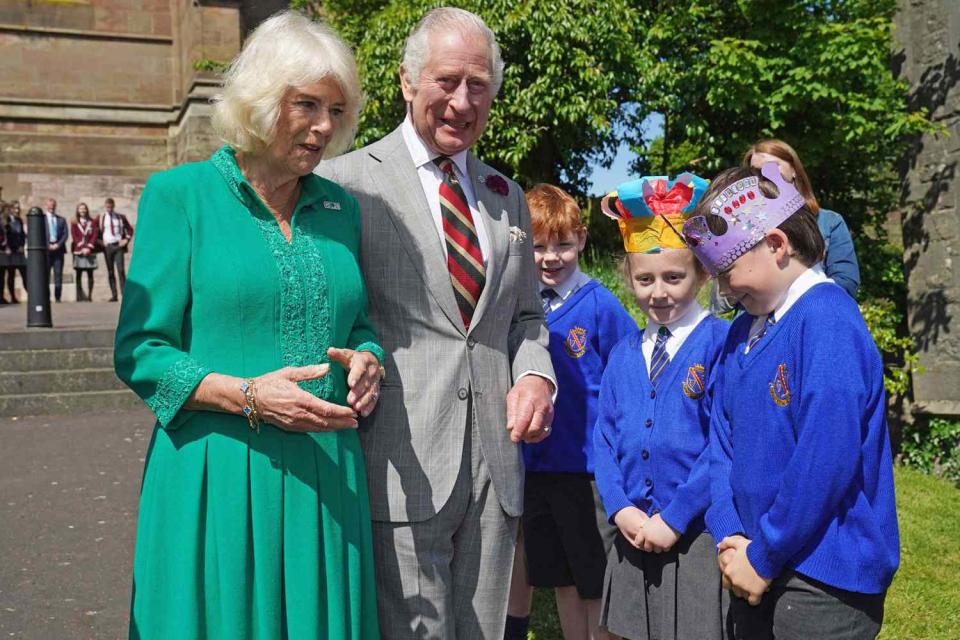 <p>BRIAN LAWLESS/POOL/AFP via Getty</p> Queen Camilla and King Charles