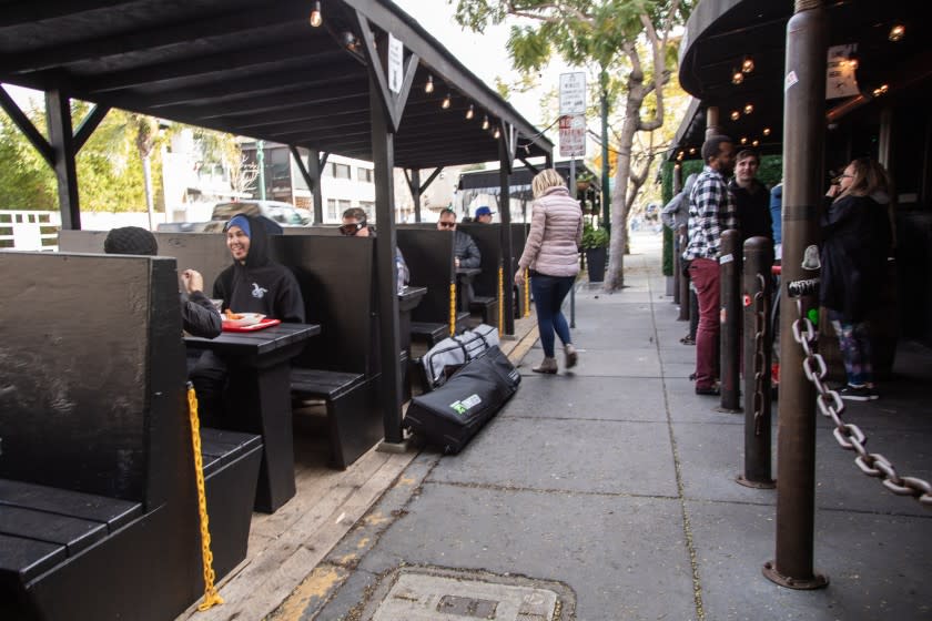 SAN DIEGO, CA - JANUARY 25: The Waterfront Bar and Grill has reopened for outdoor dining after Gov. Gavin Newsom lifted the stay at home order on Monday, Jan. 25, 2021 in San Diego, CA. (Jarrod Valliere / The San Diego Union-Tribune)