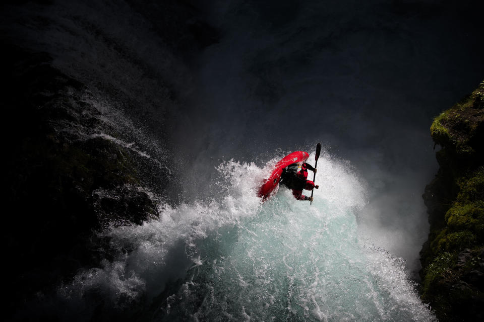&ldquo;I swear my index finger was sweating from nerves,&rdquo; says photographer&nbsp;<strong>Krystle Wright </strong>of this photograph, which she took&nbsp;using a drone with two flashes connected to it, of kayaker&nbsp;<strong>Rush Sturges </strong>as he dropped off Spirit Falls in White Salmon, Washington. &ldquo;But when Rush came over the falls and rolled the kayak, I knew as soon as I pressed the shutter that I had nailed an awesome shot&nbsp;and something that was different [from] anything that I've tried in the past.&rdquo; The shoot at Spirit Falls was intended to be a test run before trying the same setup later at Hamma Hamma&nbsp;Falls, but this &ldquo;pure experiment&rdquo; was all Wright needed. &ldquo;Turns out, I [got] the shot on the first evening. Perhaps having the mind-set of no pressure allowed me to be more relaxed and allow the shot to happen,&rdquo; she says. Even in her mellow state of mind, Wright was all business. &ldquo;I had challenged myself to nail each run in one shot so that I could keep the ISO down as much as possible. It's an interesting challenge to take away the high frame rate and really choose my moment, rather than spraying shots and hoping for the best." As a photographer and artist, I want and need to be challenged so that I can continue to evolve and try new things even if it means trying something new and failing,&rdquo; she adds. &ldquo;Thankfully, this time around, I was able to come out with a successful photo.&rdquo;