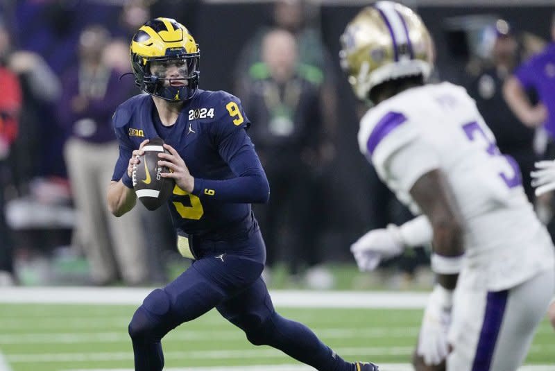 Former Michigan Wolverines quarterback J.J. McCarthy (L) is a Top 5 selection in my final mock draft for 2024. File Photo by Kevin M. Cox/UPI