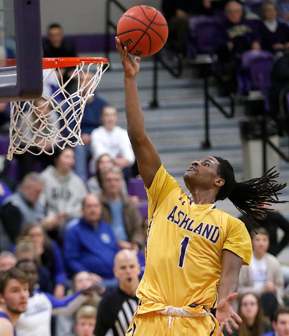 Ashland University's Brandon Haraway (1) drives in for a layup against Hillsdale College during their NCAA college men's basketball game Saturday, Feb. 26, 2022 at Kates Gymnasium. TOM E. PUSKAR/TIMES-GAZETTE.COM