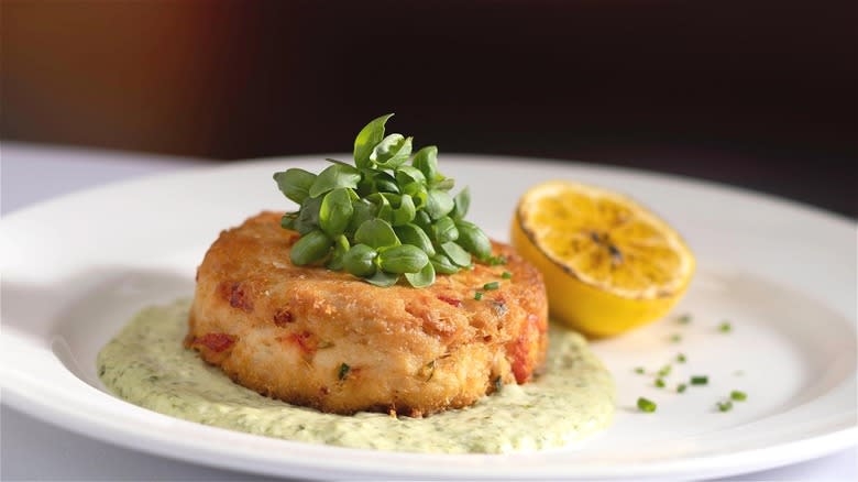 Crab cake lemon on plate