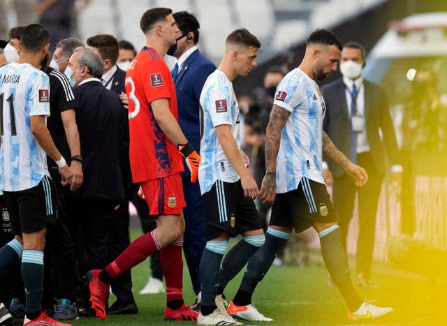 Argentina players leave the field in Sao Paulo after health officials forced the suspension of their World Cup qualifier against Brazil 