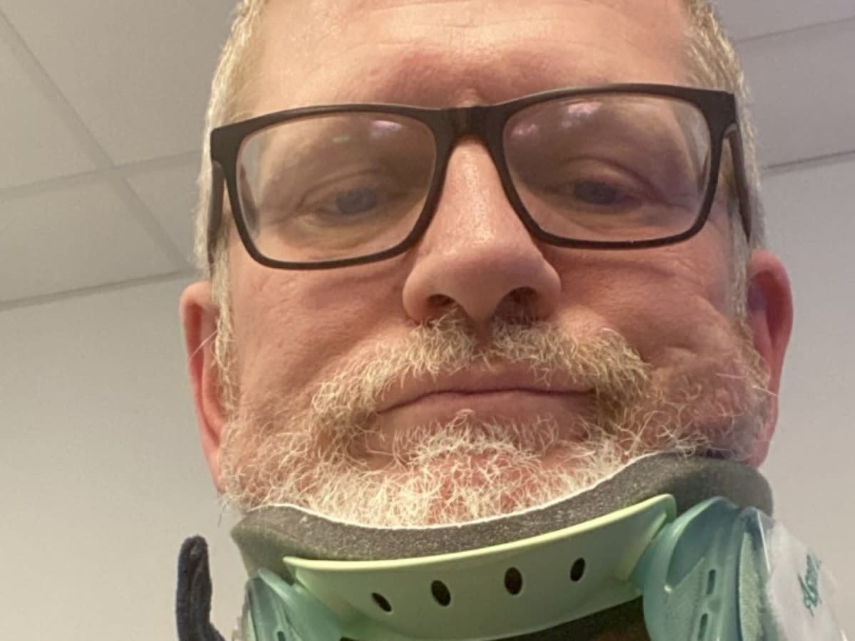 Chris Cawthorne in a neck brace following the incident. (Chris Cawthorne/SWNS)