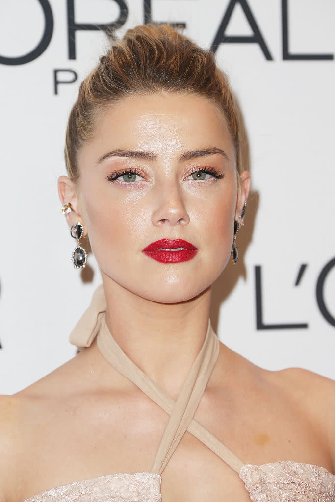 Amber Heard has penned a heartfelt open letter about domestic abuse [Photo: Getty]