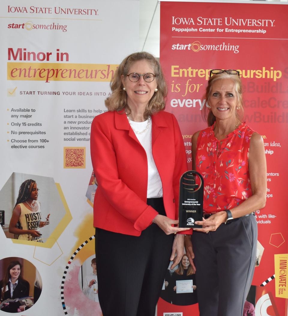 Wendy Wintersteen, Iowa State University president, holds the award ISU received in June for Entrepreneurial University of the Year for the Americas. The competition involved 33 countries.
