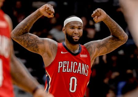 Dec 13, 2017; New Orleans, LA, USA; New Orleans Pelicans center DeMarcus Cousins (0) reacts after a score by teammate guard E'Twaun Moore (not pictured) during the fourth quarter against the Milwaukee Bucks at the Smoothie King Center. The Pelicans defeated the Bucks 115-108. Derick E. Hingle-USA TODAY Sports