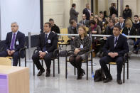 Former Catalan regional police chief Josep Lluis Trapero, right, sits in the dock with other officials at the National court on the outskirts of Madrid, Spain, Monday Jan. 20, 2020. A trial starts Monday against former Catalan regional police chief Josep Lluis Trapero and other officials for their role in the 2017 independence attempt. From left, former Catalan regional interior ministry official, Cesar Puig, former regional police director, Pere Soler, senior regional police officer Teresa Laplana and former Catalan regional police chief Josep Lluis Trapero. (Fernando Villar, Pool photo via AP)