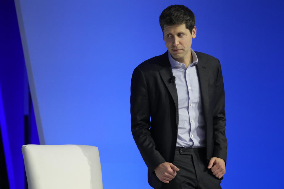 Open AI CEO Sam Altman walks to his seat to participate in a discussion entitled 'Charting the Path Forward: The Future of Artificial Intelligence" during the Asia-Pacific Economic Cooperation (APEC) CEO Summit, Thursday, Nov. 16, 2023, in San Francisco. (AP Photo/Eric Risberg)