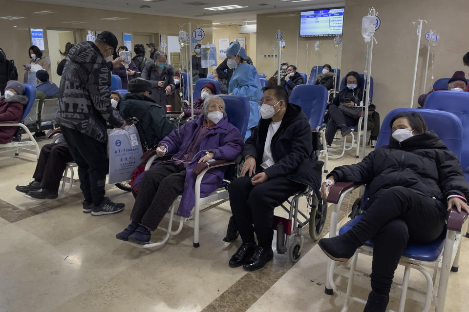 Patients receive intravenous drips in an emergency ward in Beijing, Thursday, Jan. 19, 2023. China on Thursday accused "some Western media" of bias, smears and political manipulation in their coverage of China's abrupt ending of its strict "zero-COVID" policy, as it issued a vigorous defense of actions taken to prepare for the change of strategy. (AP Photo/Andy Wong)