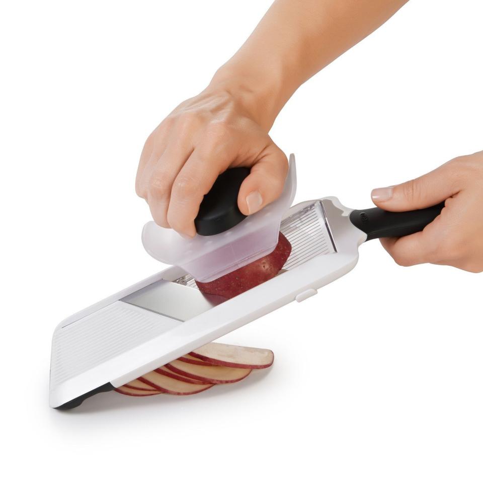 Slice at three different thicknesses with the <strong><a href="https://www.target.com/p/oxo-handheld-mandoline/-/A-11144547">OXO Handheld Mandoline</a></strong>, which is also dishwasher safe.