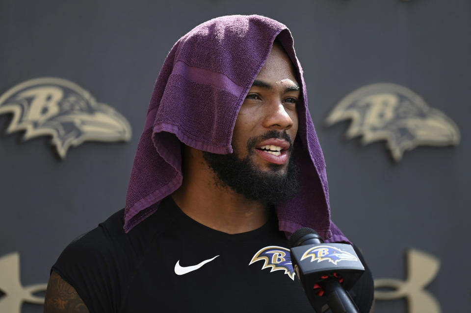 Baltimore Ravens wide receiver Rashod Bateman answers questions from the media at the NFL football team's training camp in Owings Mills, Md., Wednesday, July 27, 2022. (AP Photo/Gail Burton)