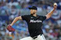 Miami Marlins' A.J. Puk delivers a pitch during the first inning of a baseball game against the Pittsburgh Pirates, Friday, March 29, 2024, in Miami. (AP Photo/Wilfredo Lee)