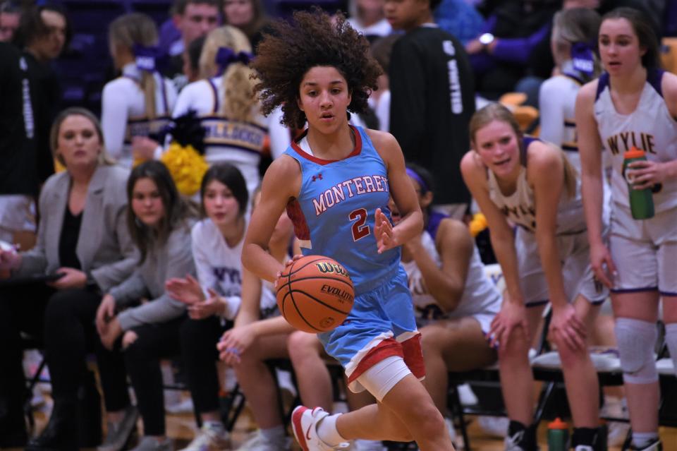 Lubbock Monterey's Aaliyah Chavez (2) pulls up with the ball during Friday's District 4-5A opener against Wylie. The No. 19 Lady Plainsmen won 58-40.