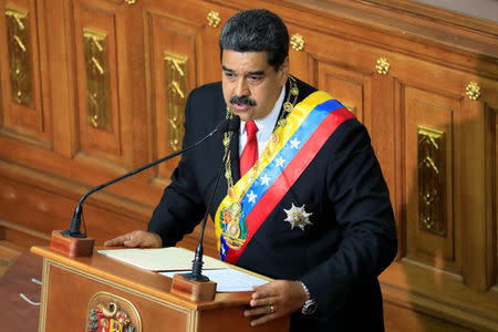 Venezuela's President Nicolas Maduro speaks during a special session of the National Constituent Assembly to take oath as re-elected President at the Palacio Federal Legislativo in Caracas, Venezuela May 24, 2018. REUTERS/Marco Bello