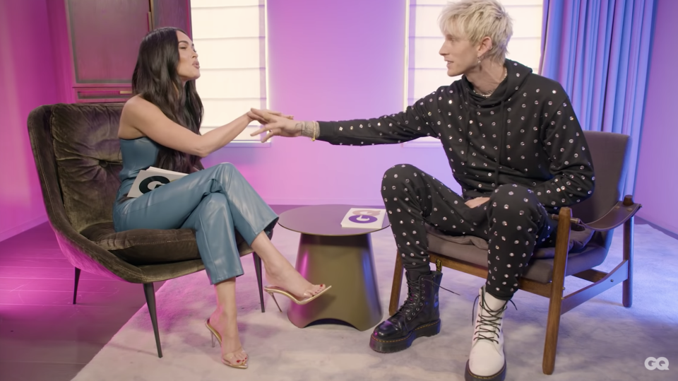 Megan Fox and Machine Gun Kelly doing their handshake