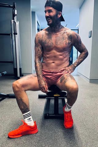 <p>Victoria Beckham/Instagram</p> David Beckham poses shirtless for Victoria Beckham's Instagram