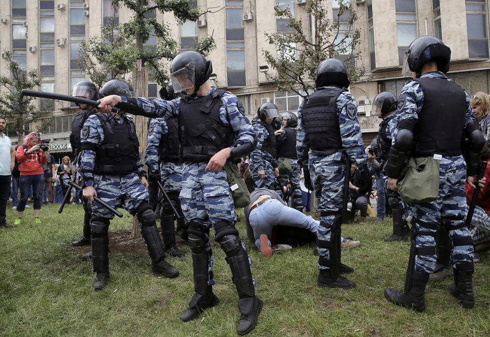 <p>Police detain protesters during a demonstration in downtown Moscow, Russia, Monday, June 12, 2017. (Pavel Golovkin/AP) </p>