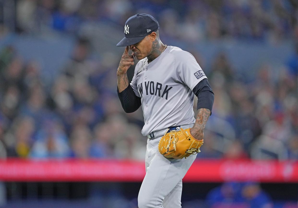Apr 17, 2024; Toronto, Ontario, CAN; New York Yankees starting pitcher Marcus Stroman (0) walks towards the dugout after being relieved against the Toronto Blue Jays during the sixth inning at Rogers Centre.