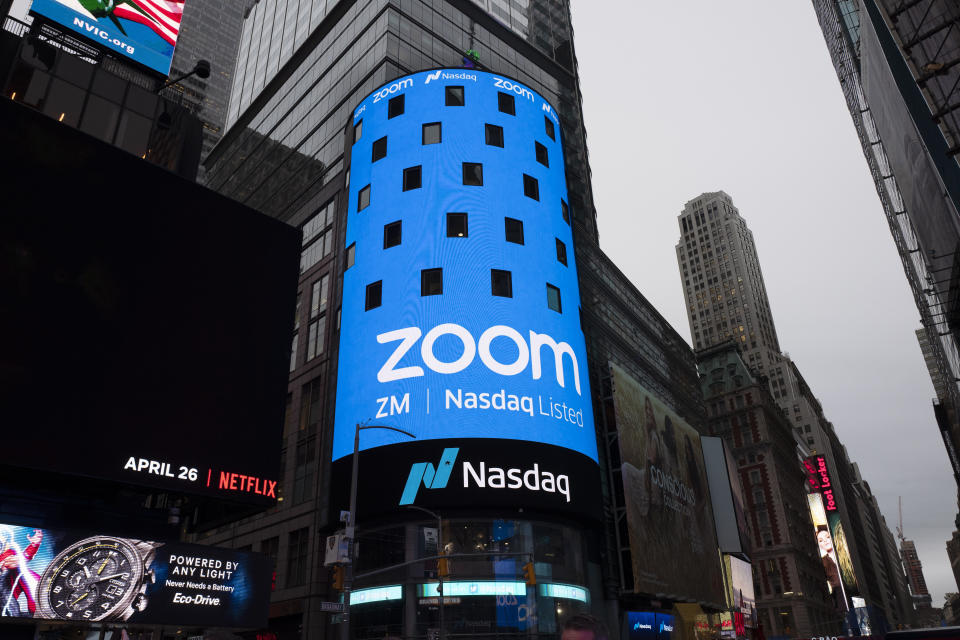 FILE - In this April 18, 2019, file photo shows a sign for Zoom Video Communications ahead Nasdaq IPO in New York. Zoom's stock touched $110 during trading Monday, Feb. 24, 2020, a level it's reached just once since its shares began trading last spring. The company has said it's seeing more business for people wanting to meet online. (AP Photo/Mark Lennihan, File)