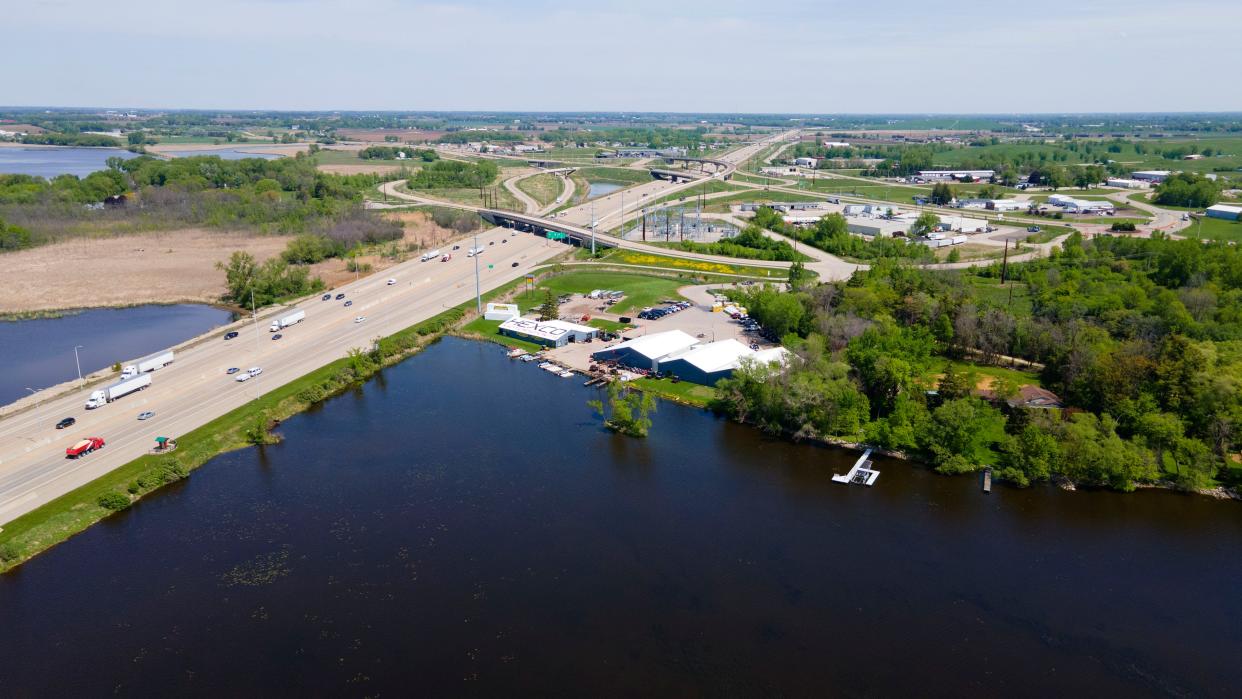 Hexco Motorsports, right, is seen along the Interstate 41 Buttes des Mort bridge looking northwest just south of U.S. 45 in Oshkosh on Tuesday, May 24, 2022.