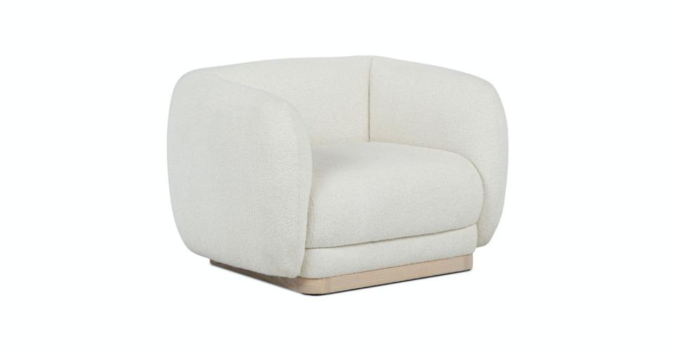 <p><a href="https://go.redirectingat.com?id=74968X1596630&url=https%3A%2F%2Fwww.article.com%2Fproduct%2F20116%2Fpinni-ivory-wool-boucle-lounge-chair&sref=https%3A%2F%2F" rel="nofollow noopener" target="_blank" data-ylk="slk:Shop Now;elm:context_link;itc:0;sec:content-canvas" class="link ">Shop Now</a></p><p>Pinni Ivory Wool Bouclé Lounge Chair</p><p>article.com</p><p>$679.00</p>