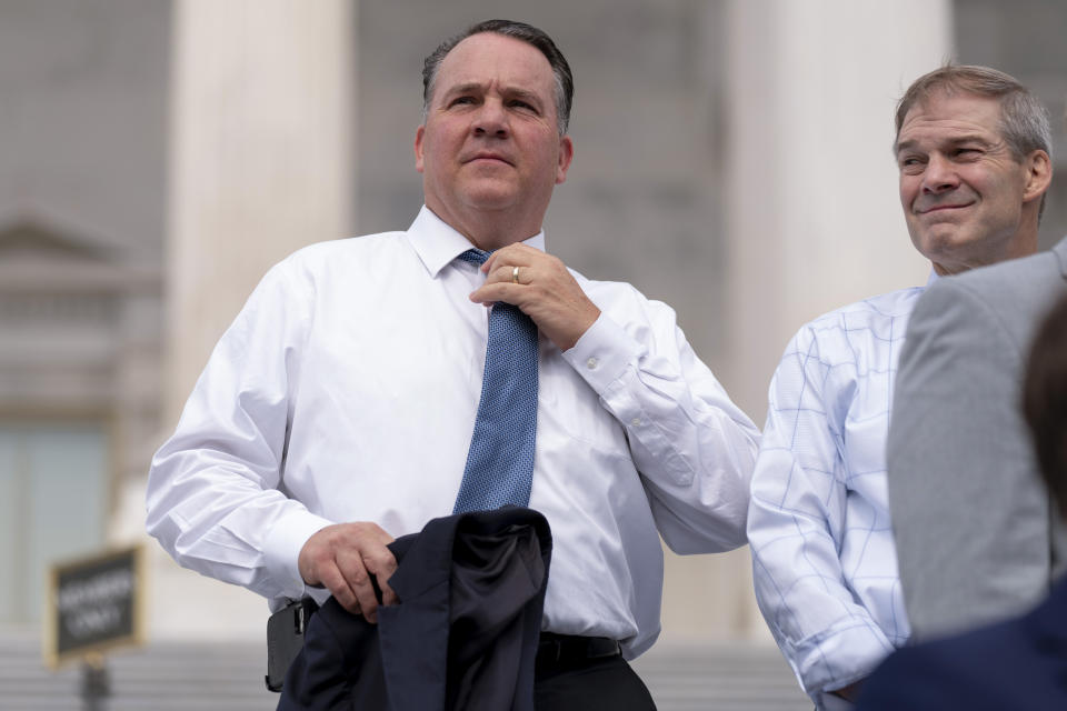 FILE - Rep. Alexander Mooney, R-W.Va., left, and Rep. Jim Jordan, R-Ohio, right, appear at a news conference on the steps of the Capitol in Washington, July 29, 2021. A Republican primary in West Virginia's 2nd Congressional District between two incumbents, Rep. David McKinley and Mooney, could hang on support for President Joe Biden's $1.2 trillion infrastructure law in the GOP-leaning state. (AP Photo/Andrew Harnik, File)