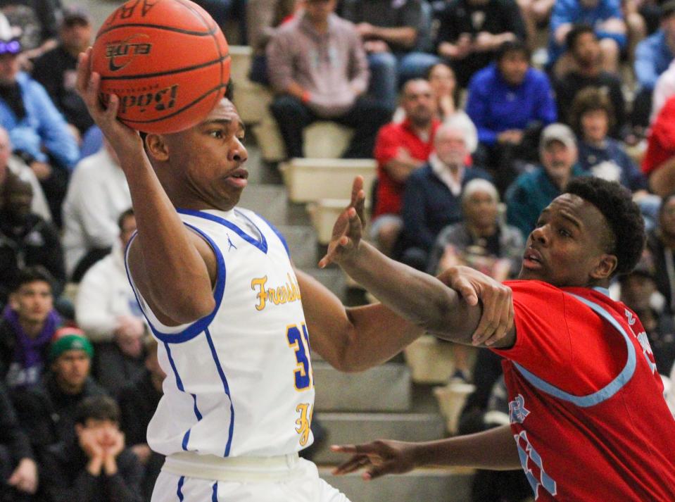 Frenship's Ose Olumese tries to save the ball in a boys basketball game as part of the Caprock Classic on Friday, Dec. 30, 2022 at Monterey High School.