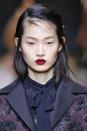 <p><strong>Trend: dark red lipstick</strong></p><p>The models' lips were bold, matte and a deep red at Rochas. For perfect precision, make sure to pre-line your whole pout with a lip liner that matches your chosen lipstick.</p>