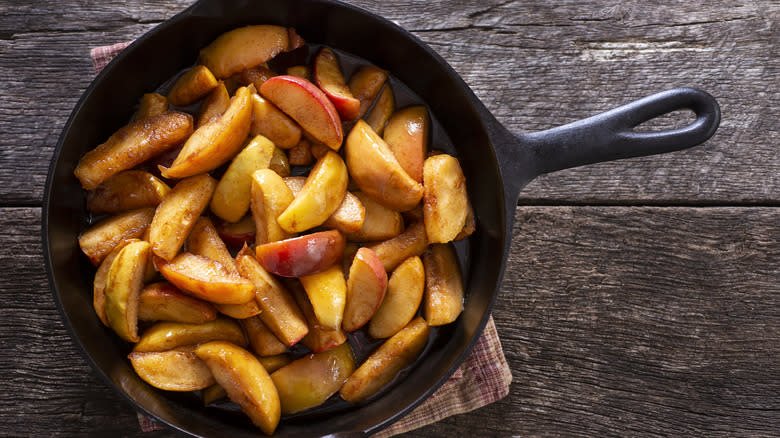 apples and cinnamon in cast iron skillet
