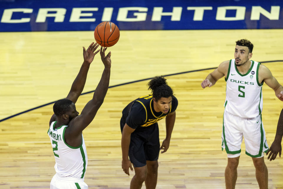 Oregon forward Eugene Omoruyi (2) shoots a free throw against Missouri during the first half of an NCAA college basketball game, Wednesday, Dec. 2, 2020 in Omaha, Neb. (AP Photo/John Peterson)