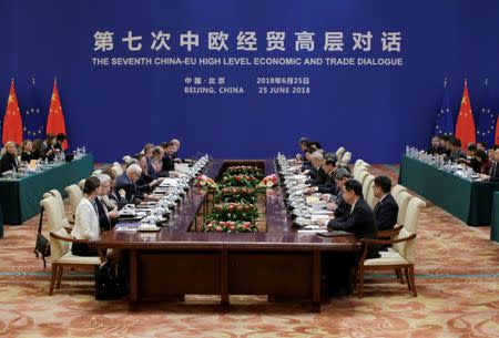 European Commission Vice President Jyrki Katainen and Chinese Vice Premier Liu He attend the EU-China High-level Economic Dialogue at Diaoyutai State Guesthouse in Beijing, China, June 25, 2018. REUTERS/Jason Lee