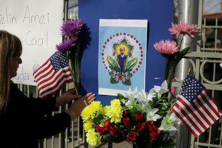 A picture of Jakelin Caal, a 7-year-old Guatemalan girl who died in U.S. custody after crossing illegally from Mexico to the U.S., is seen during a protest held to demand justice for her in El Paso, U.S. December 15, 2018. REUTERS/Jose Luis Gonzalez