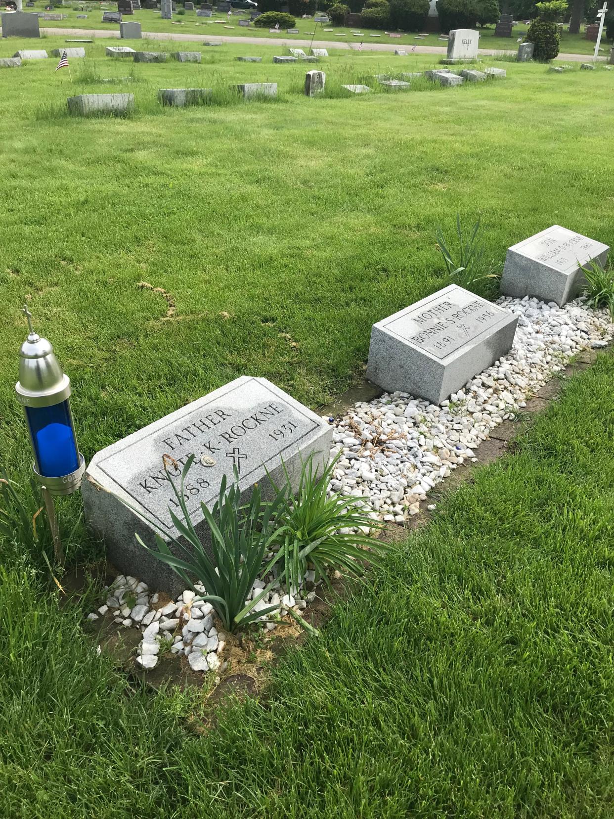 The gravestones of Knute Rockne, his wife and son,